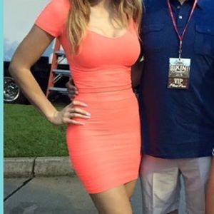 Two piece BeBe outfit in bright coral orange